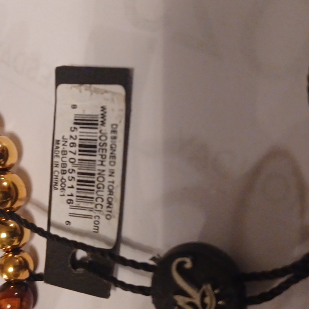BRACELET WITH GOLD TONE SPACERS AND TIGER EYES NWT BY NATASHA. - Picture 3 of 3